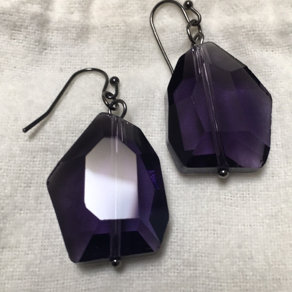 Fun purple fashion earrings.